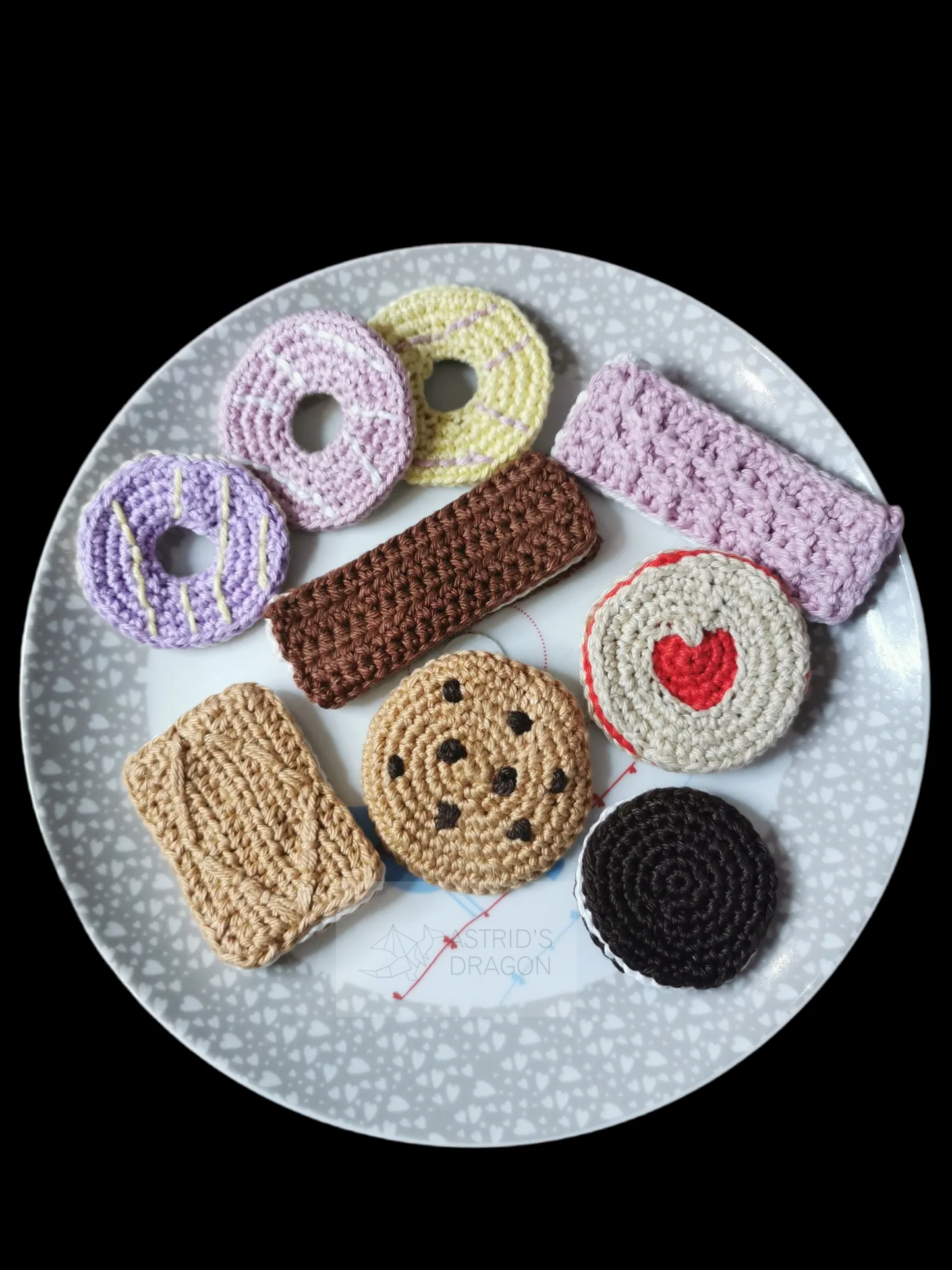 A view from above of a set of crocheted biscuits on a plate
