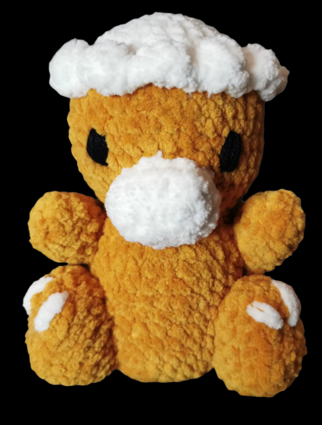 An orange crocheted Pachycephalosaurus soft toy